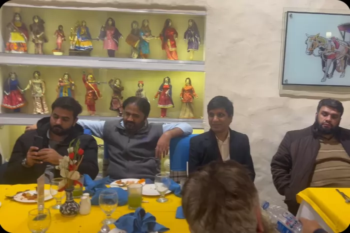 The team together at a restaurant table